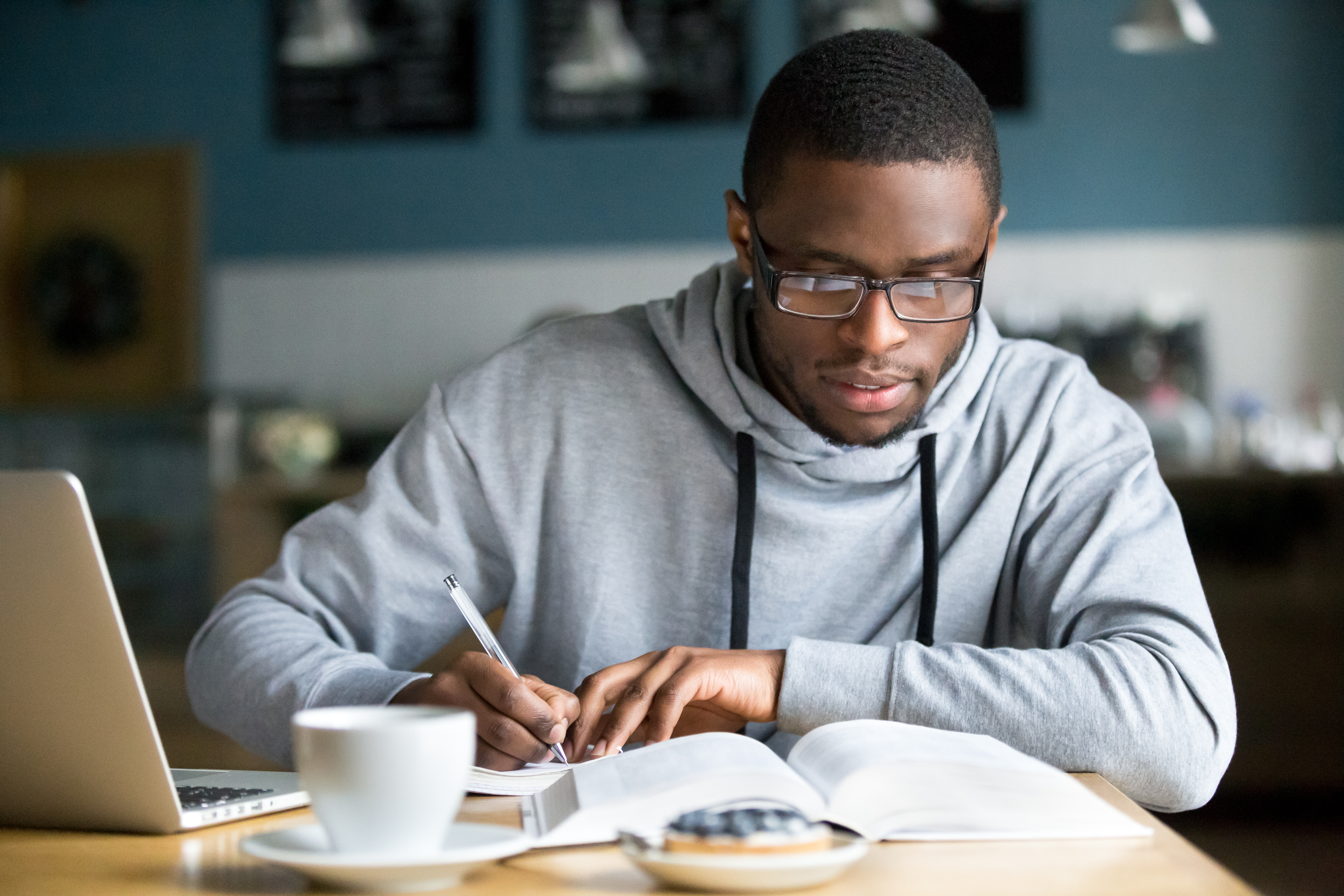 young man studying alone