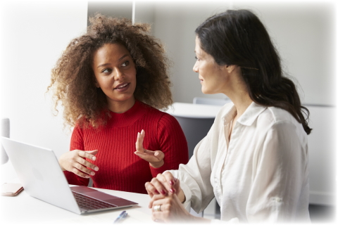 Student and Tutor Having Discussion